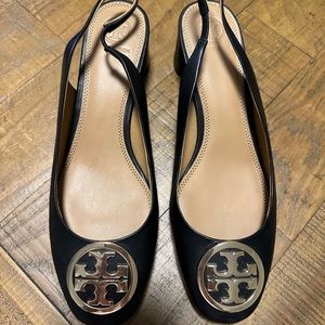Beautiful like new Tory Burch. Navy sling back heels. Size 9. Worn once.